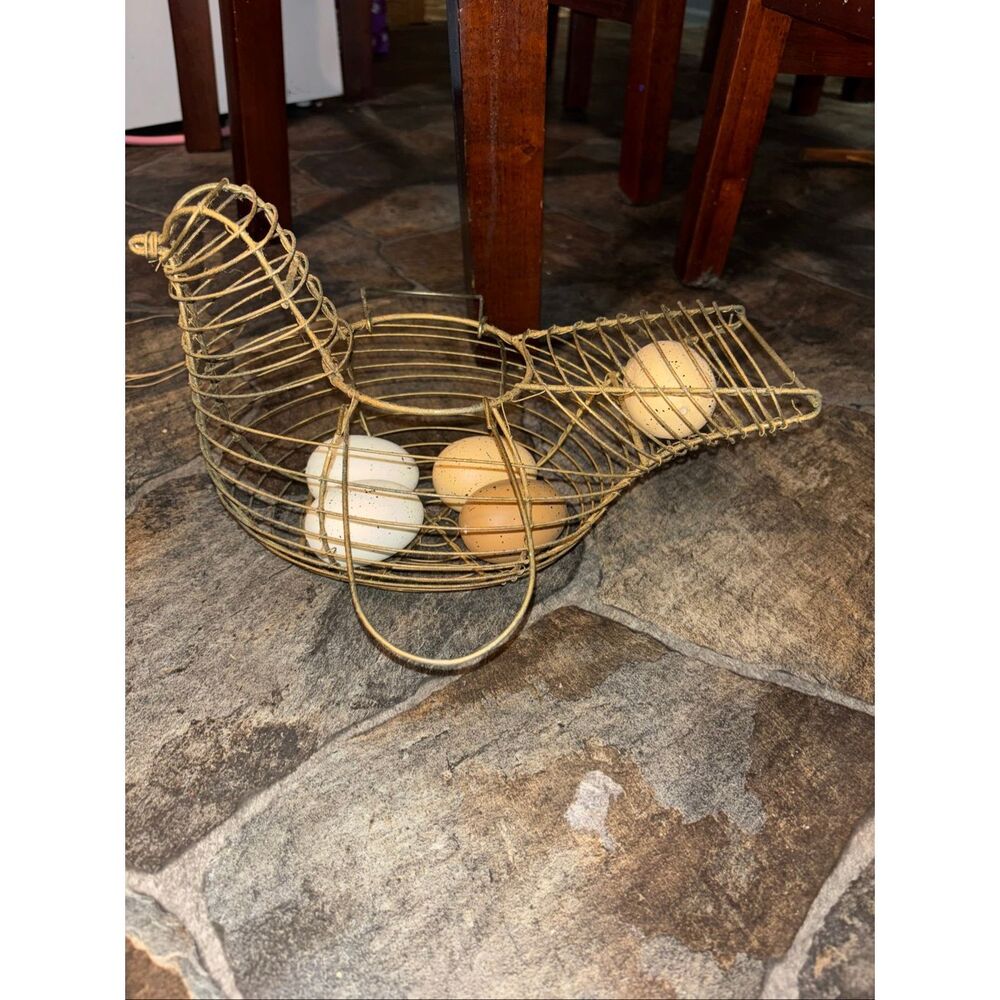 vintage-style wire egg basket shaped like a hen chicken